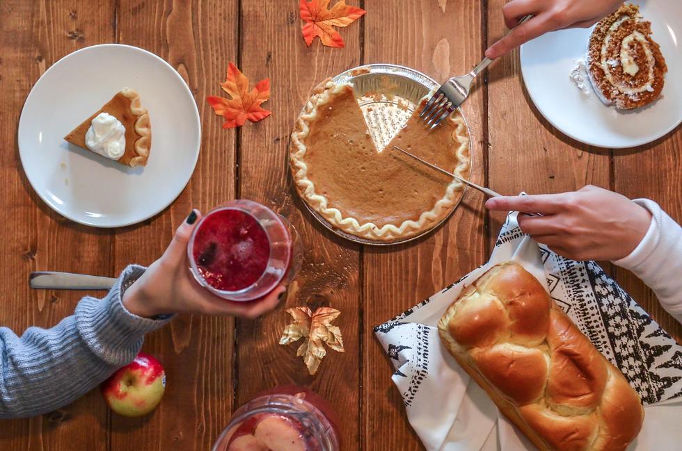 Thanksgiving dinner with pie and rolls